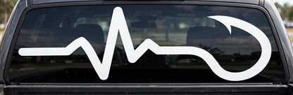Fishing Heartbeat decal applied to a truck rear window