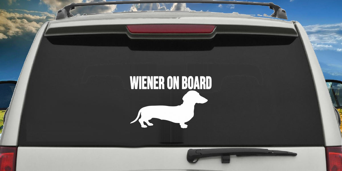 Wiener On Board decal applied to a truck rear window